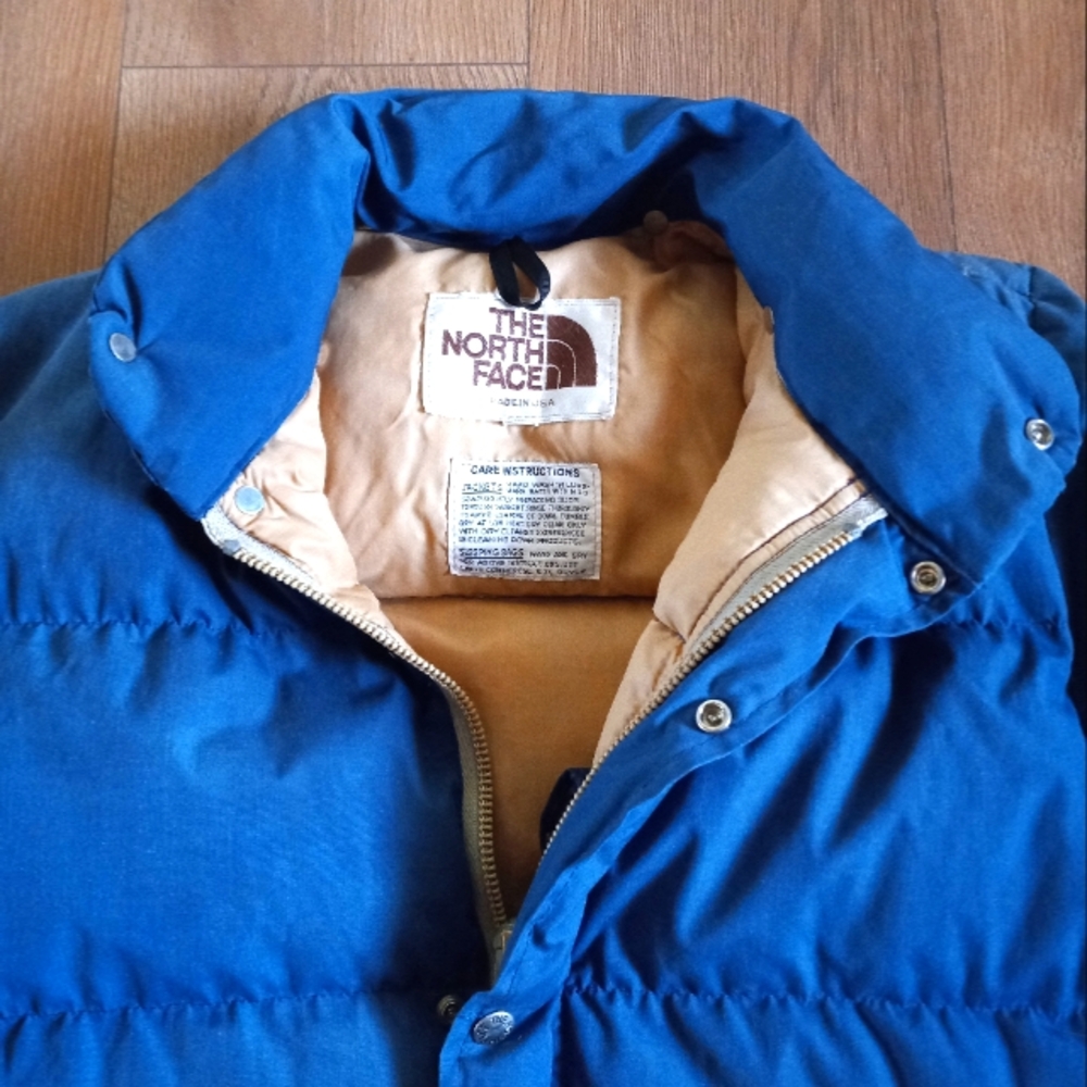 VTG 80s The North Face puffer jacket size small blue with custom stash pocket.